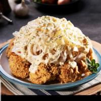 6. Snow Onion · Crispy chicken topped with sliced onions smothered in savory and cream sauce.