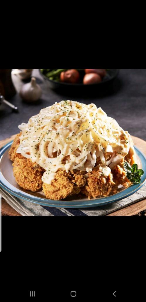 6. Snow Onion · Crispy chicken topped with sliced onions smothered in savory and cream sauce.