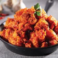 16. Tikku Red Hot Pepper Gizzard · Sweet and spicy, fried and charcoal-grilled gizzard in our addictive gochujang sauce.