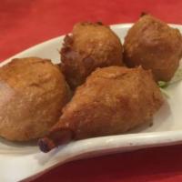 7. Drumsticks with Sweet and Sour Sauce · Fried soy chicken drumsticks. 4PC