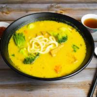 Curry Udon Soup · Curry broth with tofu, mixed veggies and udon noodles. 