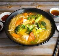 Thai Tom Yum Noodle Soup  · Thai style tom yum broth with mixed veggies, tofu and thin rice vermicelli. 