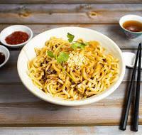 Spicy Tan Tan Noodle  · Thick wheat noodles and bean sprouts tossed in spicy peanut and sesame sauce. Spicy. Contain...