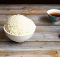 Steamed White Rice · Per bowl.
