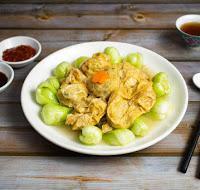 59. Golden Knots · Tofu skin stuffed with tofu & mushroom With green vegetables. Gluten free