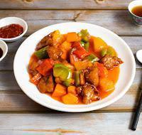 33. Sweet and Sour Chicken with Bell Peppers and Pineapple · Sweet and sour chicken, with bell peppers and pineapple.