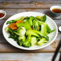45. Stir-Fried Mixed Green Vegetables · Mustard green, bok choy and broccoli. Gluten free