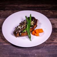 Sirloin Steak · Seared and topped with a roasted poblano, red onions and mushroom ragout and sprinkled with ...