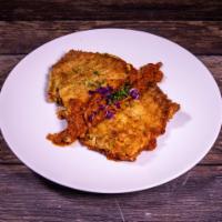 Tilapia Fillet · Pan fried tortilla crusted, over Rosa sauce, laced with a jalapeno and cilantro lime aioli. ...
