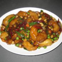 Princess Prawns · Thinly battered prawns in a sweet and spicy sauce with peas, carrots, green onions, red chil...