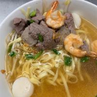 Combination Egg Noodle · Egg noodles, 
beef balls, fish balls, rear steaks and shrimp 