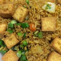 Tofu Fried Rice · Tofu stir fried with peas, carrots, brown and green onions
