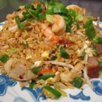 Combination Fried Rice · Fried Rice stir fried with Shrimp, BBQ Pork, Chicken, peas, carrots, bean sprouts, green and...
