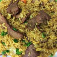 Beef Fried Rice · Beef stir fried with peas, carrots, brown and green onions