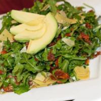 The Works Salad · Arugula, sundried tomatoes, roasted peppers, avocado, artichokes, lemon dressing and extra v...
