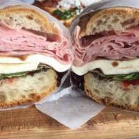 11. Toscana Panini · Parma cotto, mozzarella cheese, sweet peppers and spring mix.