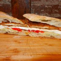 24. Di Francesca Panini · Fried cutlet, mozzarella, sweet peppers and artichokes.