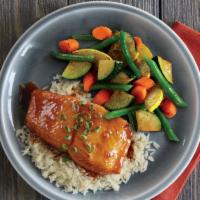 Honey Ginger Salmon · Grilled Salmon fillet brushed with a house-made honey ginger glaze, atop rice and served wit...
