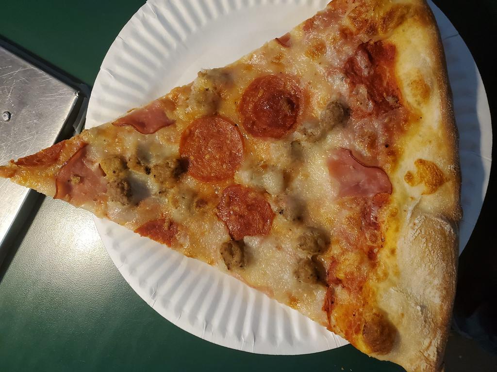 Meat Lover's Pizza Slice · Pepperoni, Canadian bacon, hamburger and sausage.
