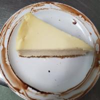 Plain Cheesecake · Our New York style cheesecake featuring a traditional graham crust and rich creamy filling a...