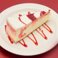 Strawberry Cheesecake · Our New York style cheesecake featuring a traditional graham crust and rich creamy filling a...