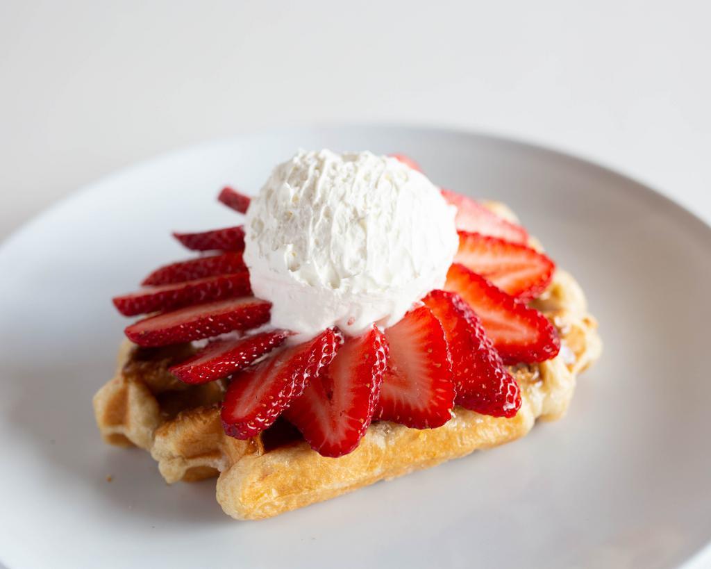 The Works Waffle · Crunchy Biscoff, choice of fruit and fresh whipped cream.