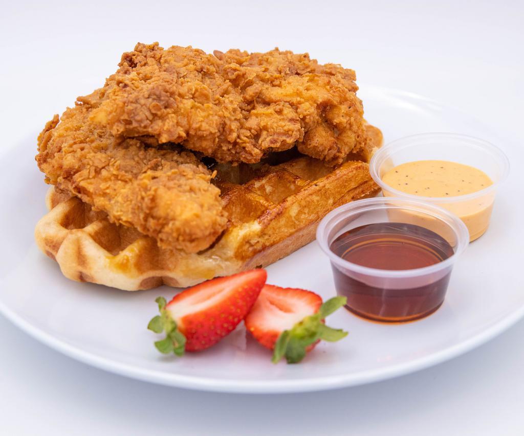 Chicken and Waffles · 2 jumbo fried chicken tenders on a liege waffle.