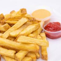 Fresh Cut Thick Fries · Fresh cut fries in store, crispy perfection