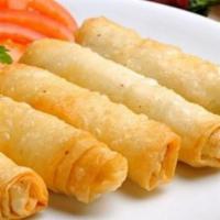 16. Cigar Borek · 5 pieces. Golden fried pastry filled with feta cheese and parsley.