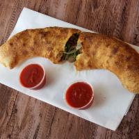 Veggie Stromboli · Mozzarella, mushrooms, onion, green pepper and spinach.