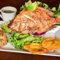 36. Pargo Frito  · Fried snapper with coconut rice. Served with rice and salad.  