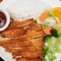 Chicken Katsu · Seasoned chicken breast, panko breaded and deep-fried then cut into strips and served with o...