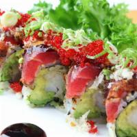 Izumi Roll · Shrimp tempura and avocado inside topped with pepper tuna, crunchy and tobiko with eel sauce...