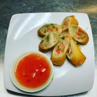 Crispy Spring Roll · Crispy vegetable roll served with Sweet chili sauce.