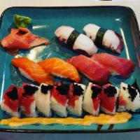 Allen Roll · Salmon, shrimp tempura, avocado, jalapeno topped with tuna, super white tuna, tobiko, and ho...