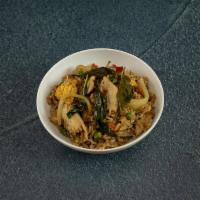 49. Spicy Basil Fried Rice · Rice stir fried with meat, veggie, pepper, onions, green onions, basil, green peas, egg and ...