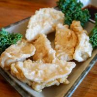 8. Gyoza · Pork or vegetable shrimp dumpling served with chili sauce. 