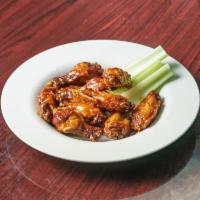 10 Piece Wings · Mild, medium, hot, honey barbecue, garlic, sweet chili served with bleu cheese or ranch dres...