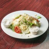 House Salad · Lettuce, tomato, cucumber, red onion, green pepper, and cheese.
