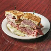 Jimmy's New Yorker Sandwich · Hot pastrami, corned beef, bratwurst, Swiss cheese, onions, and spicy mustard on rye bread.