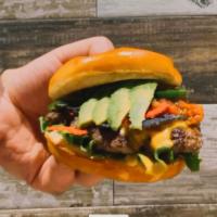 The Macho Nacho Burger · Single Patty, Green Leaf Lettuce, Grilled Jalapeños, Fresh Mild Garden Salsa, Tortilla Strip...
