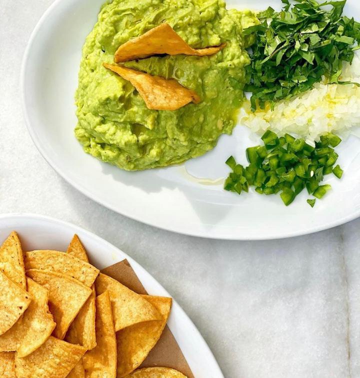 Guacamole & Chips · house made guacamole, diced onions, cilantro, & jalapeño with baked corn chips