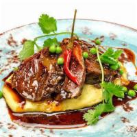 Veal Cheeks with Mashed Potatoes and Gravy · Tender Veal Cheeks with Mashed Potatoes and Gravy