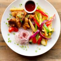 Chicken Kebab · Served with toasted pita, onion and homemade sauce 