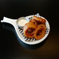Whiskey Battered Onion Rings · Whiskey battered and fried onion rings.