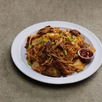23. Pan Fried Rice Noodles with Beef · Tossed with green onion, white onion and bean sprouts.
