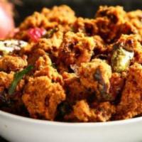 Mixed Vegetable Pakora · Sliced battered mixed vegetables like bell pepper, cauliflower, spinach fritters. Served wit...