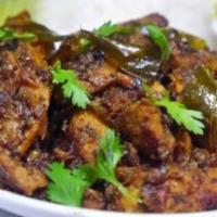 Chicken Roast · Boneless chicken tossed in green chillies and curry leaves