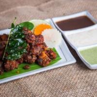 Kothimera (Cilantro) Chicken · Boneless chicken fried and tossed with green chilies, Cilantro & spices