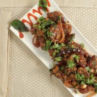 Mutton Roast Boneless · Boneless Lamb tossed with green chilies, curry leaves